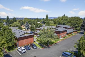 Aerial with parking lot, landscaped gardens at Lincoln Court Townhomes, 230 Lincoln Street, Fairview, Oregon 97024