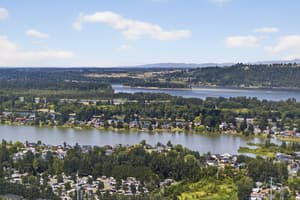 Aerial with river view, lush forests at Lincoln Court Townhomes, 230 Lincoln Street, Fairview, Oregon 97024