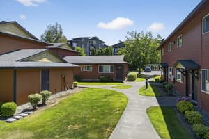 Exterior with manicured lawns, walkways at Lincoln Court Townhomes, 230 Lincoln Street, Fairview, Oregon 97024